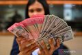 Rupiah Rabu pagi dibuka melemah di level Rp17.878 per dolar AS